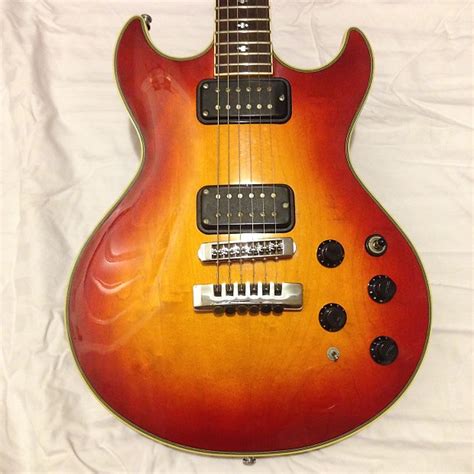 Fender Flame Elite 1984 Sunburst .